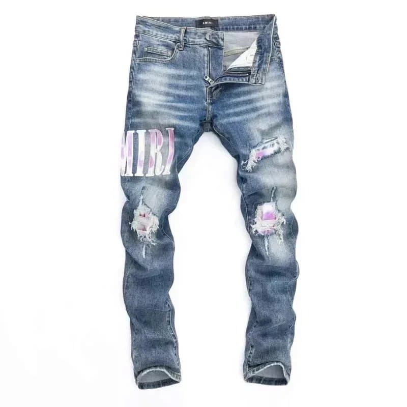 Amiri Distressed Denim Jeans with Graphic Print