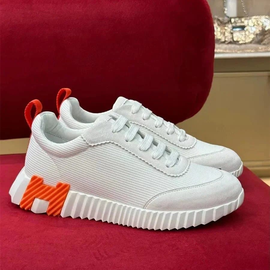 White Sneakers with Orange 'H' Logo Detail