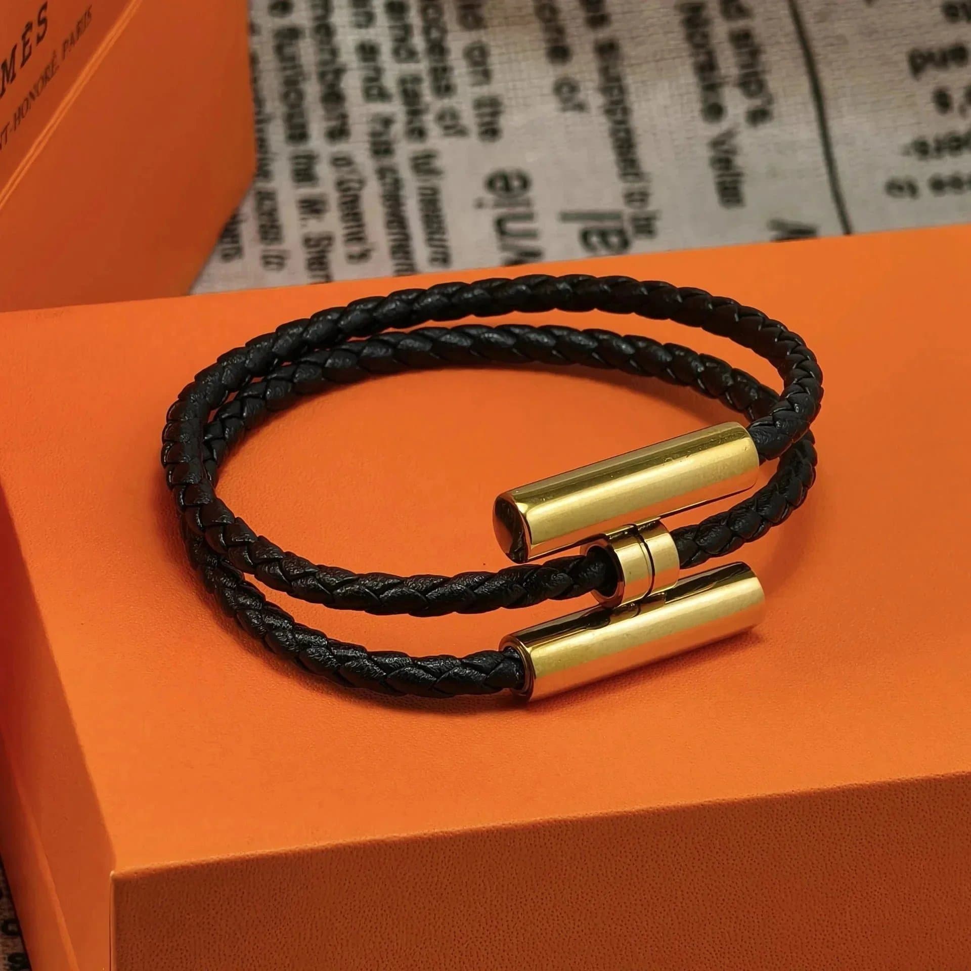 Hermès Braided Leather Bracelet with Gold Clasp